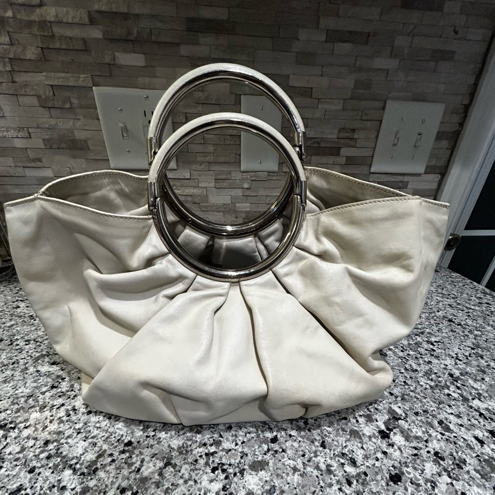 Dior Bebe Cream Handbag with Silver Accents with pouch.